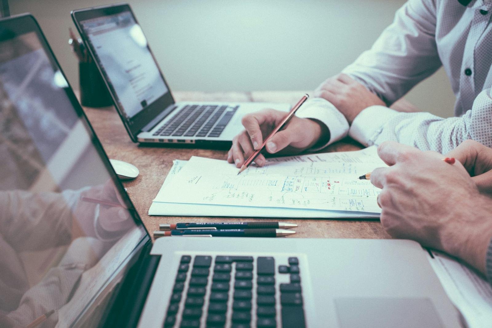 Consultants reviewing a business plan